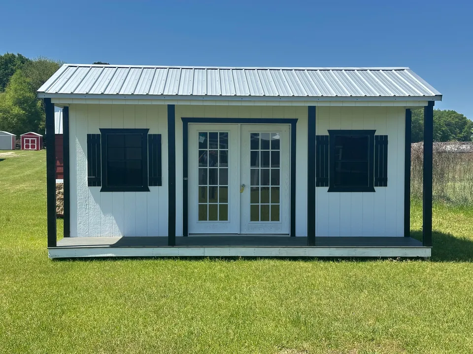 White side-porch cabin from the front